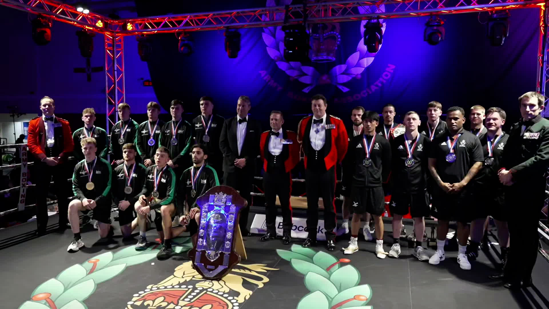 Victorious boxers from 3 PARA and runners up from 2 RIFLES pose at the Army Inter Units Final trophy presentation
